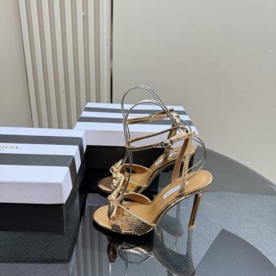 Aquazzura 代购品质 原版开发2025新款蝴蝶结蛇皮高跟凉鞋 绝对是时尚圈的宝藏单品 蛇皮元素自带神秘野性 好似丛林中走出的精灵 而那俏皮的蝴蝶结 又温