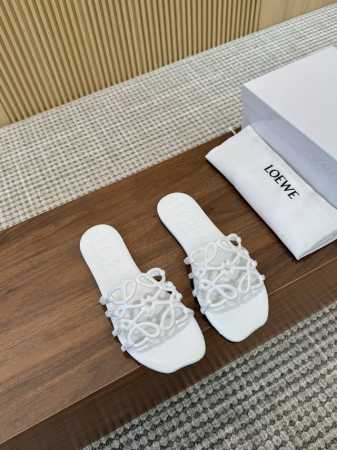 橙子出厂价p loewe 罗意威春夏新品petal Anagram 设计感镂空平底拖鞋 休闲凉拖 度假沙滩鞋 疯狂种草简约设计感觉更干净优雅 让你念念不忘 颜色 - 点击图像关闭