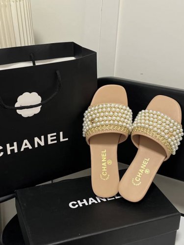 橙子出厂价p chanel 香奈儿 春夏新款 珍珠装饰平底拖鞋 精致凉拖 时尚界经典之作 承袭品牌优雅精髓 珍珠点缀 精致又浪漫 瞬间提升穿搭格调 镶钻跟粗跟设