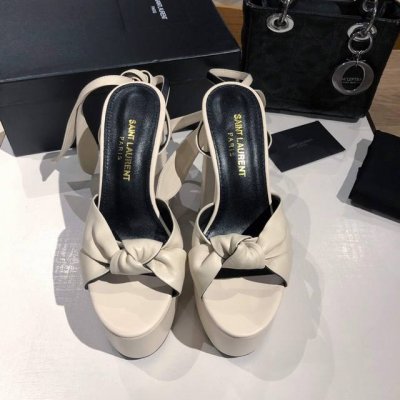 saint Laurent 圣罗兰 Ysl专柜主打款防水台恨太高绑带凉鞋。高端定制顶级品质。延续家族经典鞋面蝴蝶结设计，简约大气，防水台超高大粗跟让Mm轻松驾驭