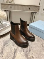 Prada 普拉达 24*秋冬最新发布厚底弹力布短靴 面皮：开边珠牛皮 牛皮， 内里：进口混种羊皮里 大底：原版生胶耐磨底 厚底 码数：35～39 40、41定
