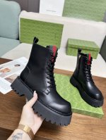 2024最新版古琦GUCCI百搭绑带马丁靴，方便穿脱‘品牌织带拼色搭配 跟高：5cm 面料：牛皮 开边珠 内里 垫脚：羊皮里。 大底是发泡大底材质 颜色：黑色