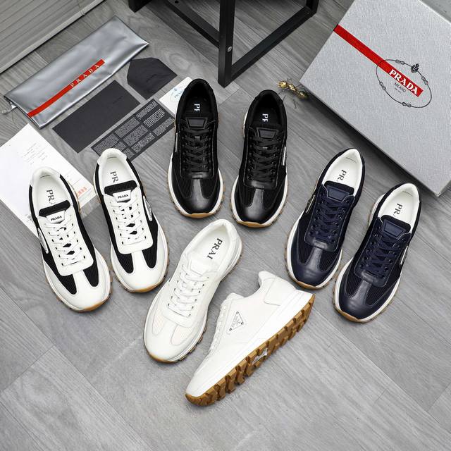 商品商标：Prada 普拉达 休闲鞋 正码码数: 38-44 商品材料：精选 牛皮鞋面 牛皮鞋垫 透气网内里 原版大底
