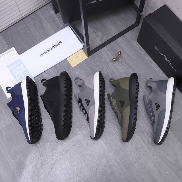 商品商标：阿玛尼 Armani 休闲鞋 正码码数: 39-44 45定做不退换 商品材料：精选牛皮拼接飞织鞋面 牛皮鞋垫 原版大底