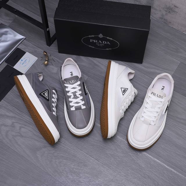 商品商标：Prada 普拉达 商务休闲男鞋 正码码数: 38-44 45定做不退换 商品材料：精选 牛皮拼接品牌网布透气鞋面 网内里 牛皮鞋垫 橡胶大底
