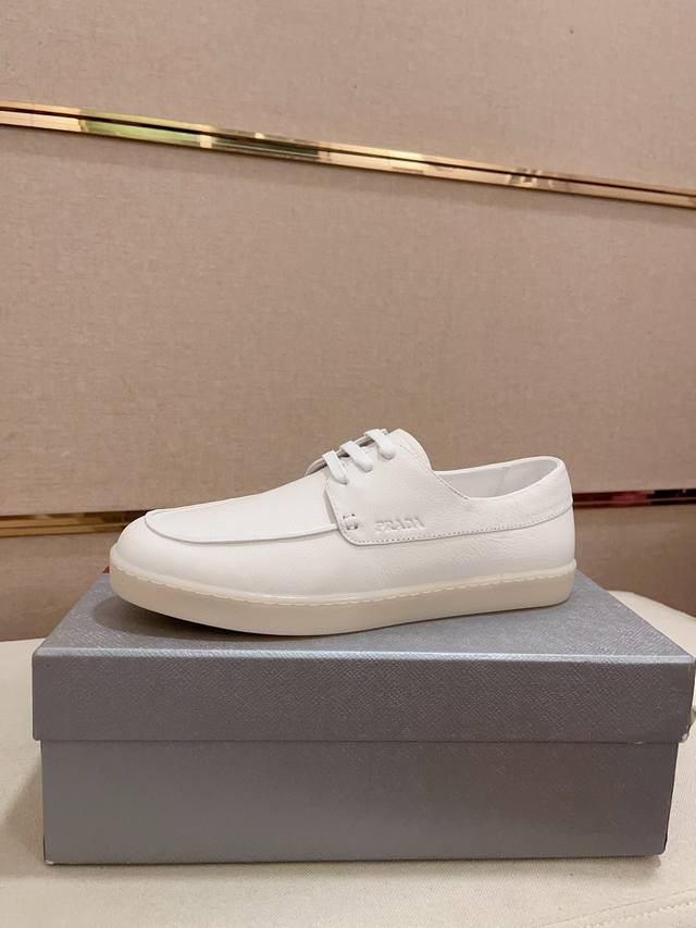 工厂P价 高版本 高品质新款Prada 普拉达 专柜同步上市， 新款男鞋、面料精选高科技滴胶工艺制作而成。内里:全牛皮内里。高端气垫开模防滑橡胶大底，精美线条、