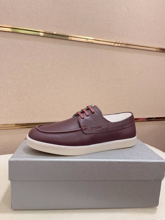 工厂P价 高版本 高品质新款Prada 普拉达 专柜同步上市， 新款男鞋、面料精选高科技滴胶工艺制作而成。内里:全牛皮内里。高端气垫开模防滑橡胶大底，精美线条、