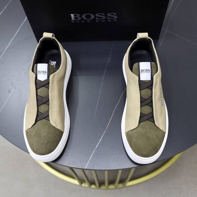 出厂价Pp： 品牌：Boss 标准码：38-44 45订做 等级：官网同款 材料：原版材料拼接 舒适透气内里 轻便耐磨运动大底 款式类别：男士时尚休闲鞋 跑步