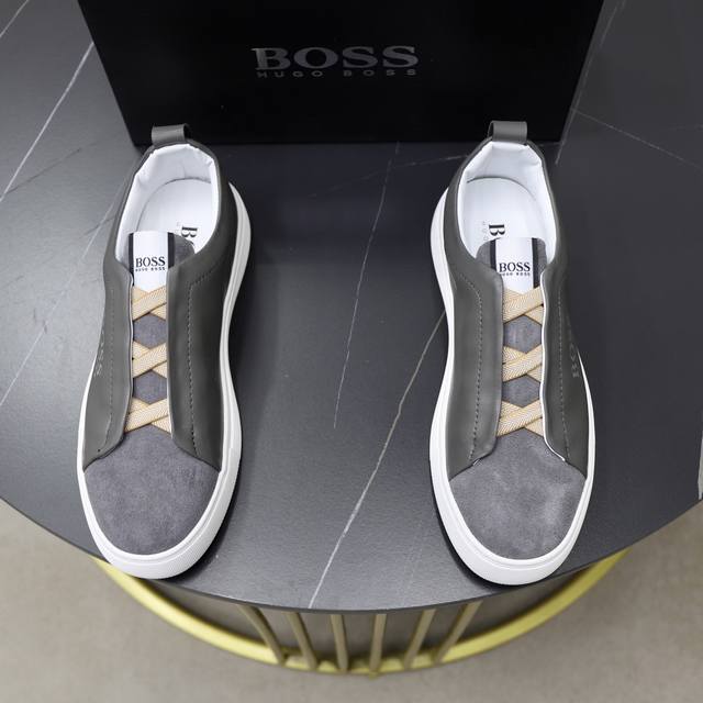 出厂价Pp： 品牌：Boss 标准码：38-44 45订做 等级：官网同款 材料：原版材料拼接 舒适透气内里 轻便耐磨运动大底 款式类别：男士时尚休闲鞋 跑步