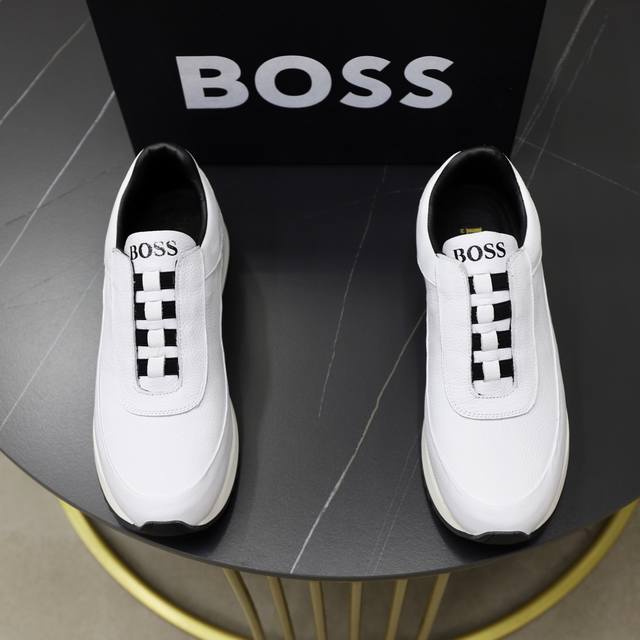 出厂价Pp： 品牌：Boss 标准码：38-44 45订做 等级：官网同款 材料：原版牛皮面拼接 舒适透气羊皮内里 轻便耐磨运动大底 款式类别：男士时尚休闲鞋