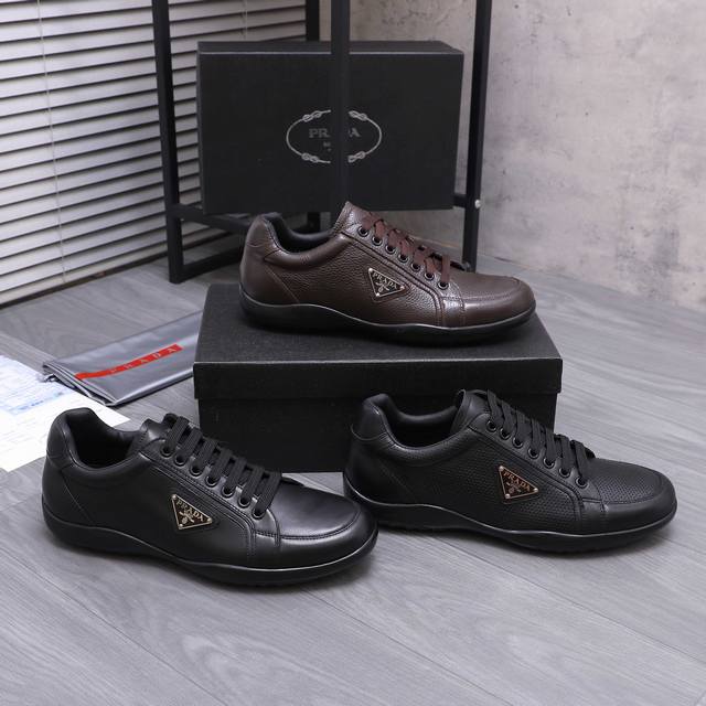 商品商标：Prada [普拉达] 休闲鞋 正码.码数: 38-46 45.46定做不退换 商品材料：精选 荔纹牛皮拼接鞋面 牛皮内里 防滑橡胶大底