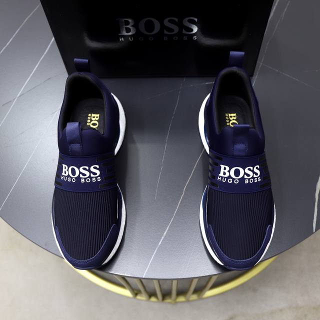出厂价Pp： 品牌：Boss 标准码：38-44 45订做 等级：官网同款 材料：原版皮料拼接 舒适透气内里 原厂耐磨大底 款式类别：男士时尚休闲鞋 跑步 运动