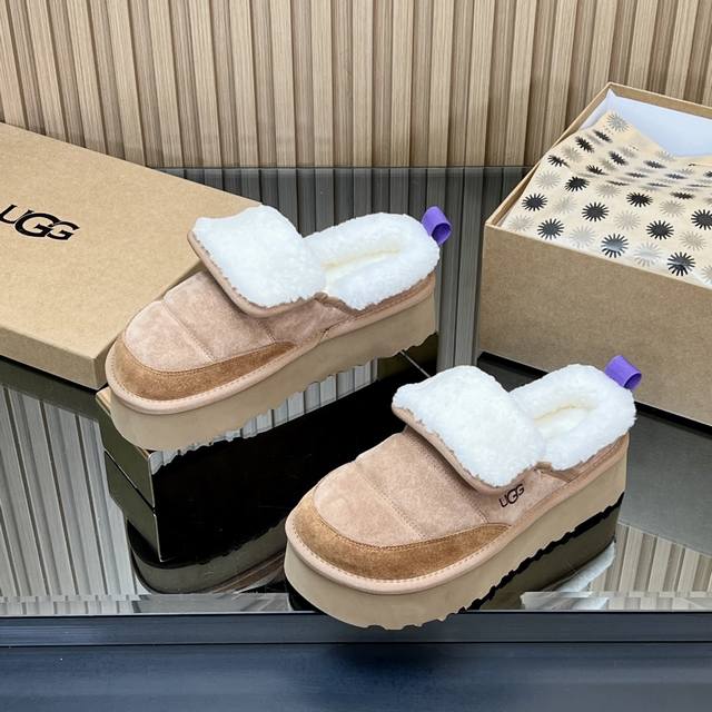 高版本 Ugg冬季爆款毛毛虫雪地靴！厚实温暖的羊皮毛一体，零下的安全感都是它给的各种时尚混搭都可搭配！打理十分方便，真正皮毛一体整个鞋靴内里都是羊毛，踩上去像是