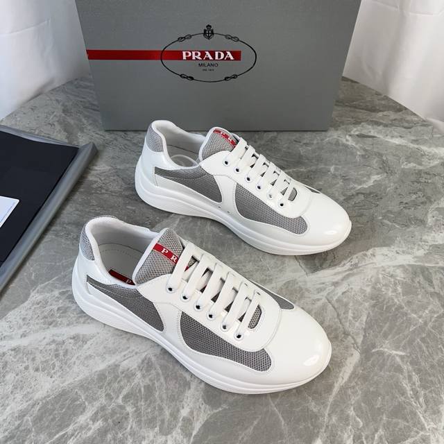 P家经典款 面：头层牛漆皮+品牌网布 里：进口Bk网布 垫：牛皮冲孔透气垫脚 底：原版开模花纹防滑橡胶底 原版包装 Size:35-45