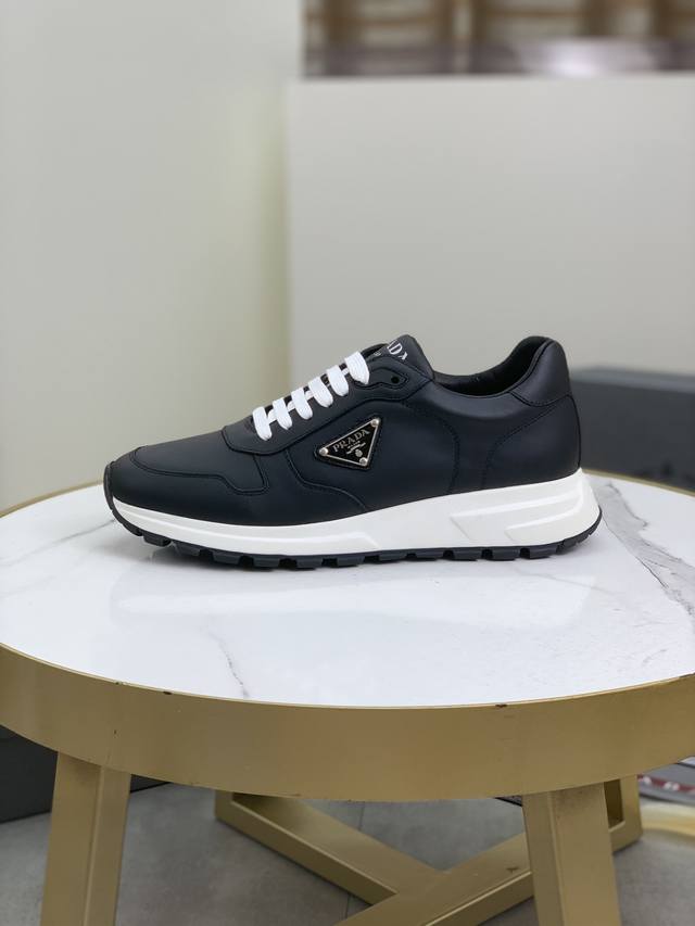 品牌：Prada 普拉达 等级： 原单品质 材料：原版材质拼接透气网面 原版发泡大底 颜色：实物图 码数：38-45 45定做不退换 出厂价Pp：