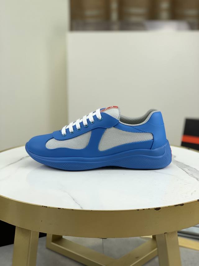 普拉达Prada顶级版运动鞋 鞋面：进口飞织面料拼接软橡胶， 羊皮内里+牛皮踮脚， 耐磨防滑轻便大底， 男女同款： 码数：35-47码： 45.46.47定做