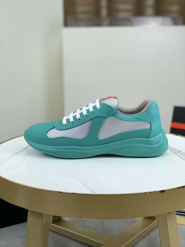 普拉达Prada顶级版运动鞋 鞋面：进口飞织面料拼接软橡胶， 羊皮内里+牛皮踮脚， 耐磨防滑轻便大底， 男女同款： 码数：35-47码： 45.46.47定做