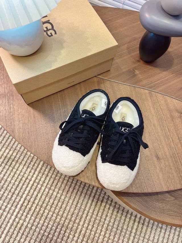 Ugg 女款Size：35-40 Ugg秋冬羊卷毛系带款毛毛雪地靴！ 鞋面采用撞色的设计，既缔造出经典而耐看的质感，搭配柔软温暖的羊卷毛设计，不仅提升质感，更为