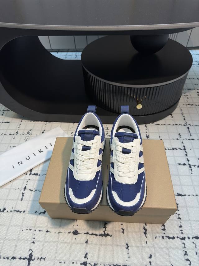 Inuikii运动鞋 这双鞋的颜值简直逆天了！每一处细节都彰显着高级与时尚。 材质方面更是没得说，采用了顶级的面料，触感柔软舒适，上脚后的感觉更是惊艳，不仅舒适