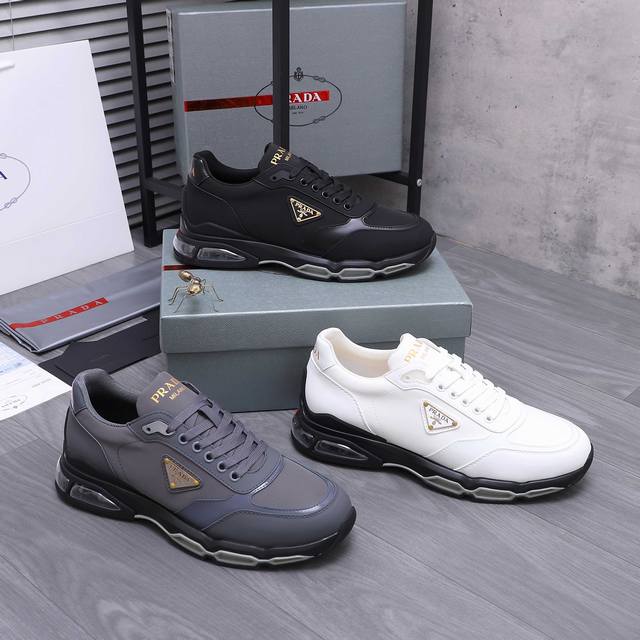 商品商标：prada [普拉达] 休闲鞋 正码.码数: 38-44 商品材料：精选 牛皮拼接织布鞋面 网内里 牛皮鞋垫 原版复合大底
