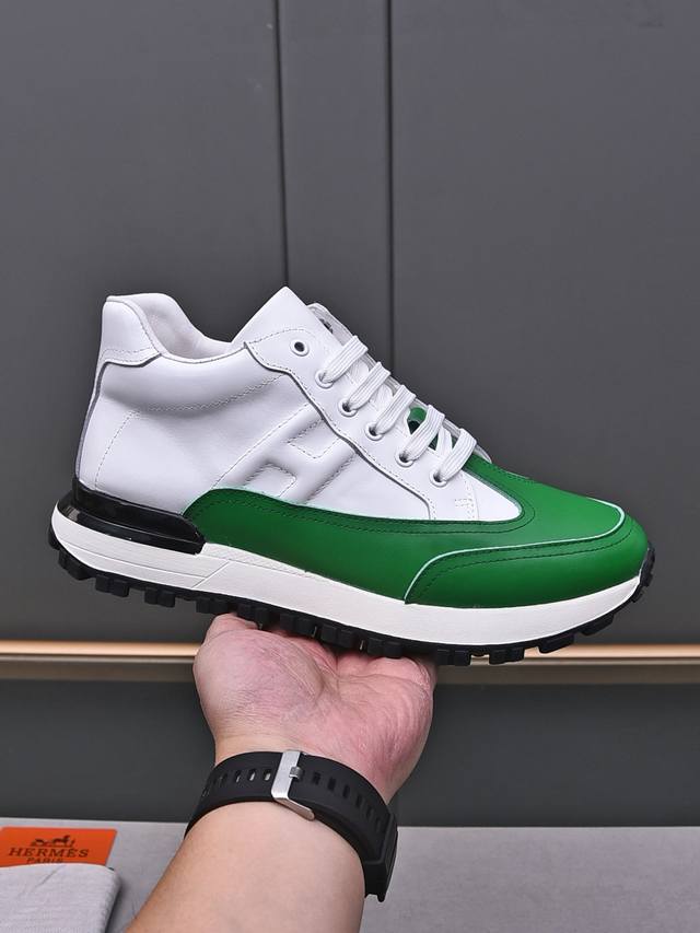 调工厂p价p调工厂p价p调工厂p价 Hermes 爱马仕高帮男鞋 男士拼色运动鞋，饰有富有质感的小牛皮细节。拼接原版牛皮面，此鞋款从马术世界汲取灵感，融合技术细