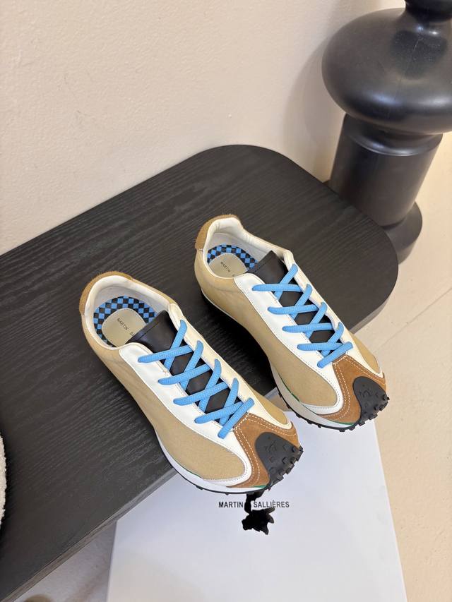 Martin Sallieres潮流运动鞋 融合户外功能性与都市潮流感，采用标志性的流线型鞋身设计，搭配大面积的透气结构，兼具视觉张力与实用性；鞋带系统极具辨识