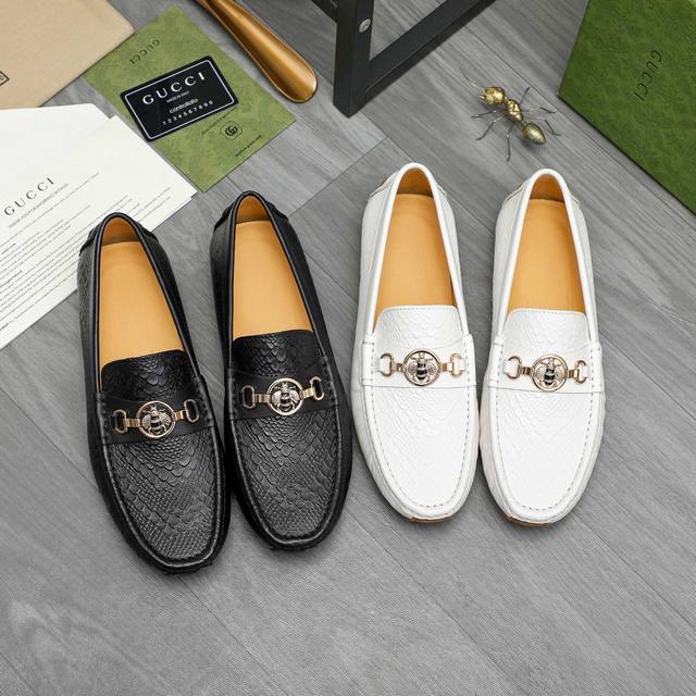 商品商标：Gucci 古驰 休闲套脚男鞋 DDD 正码码数: 38-45 DDD 商品材料：精选蛇纹牛皮鞋面 猪皮内里 橡胶大底 DDD