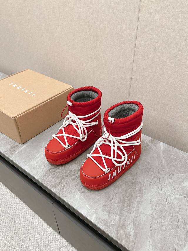 Inuikii潮牌秋冬秀款羽绒靴滑雪鞋 这款滑雪鞋今年非常爆，色彩搭配非常时尚 超酷个性非常强！潮派炸街！各大网红明星同款！冬季滑雪必备爆款 DDD 面料：进口